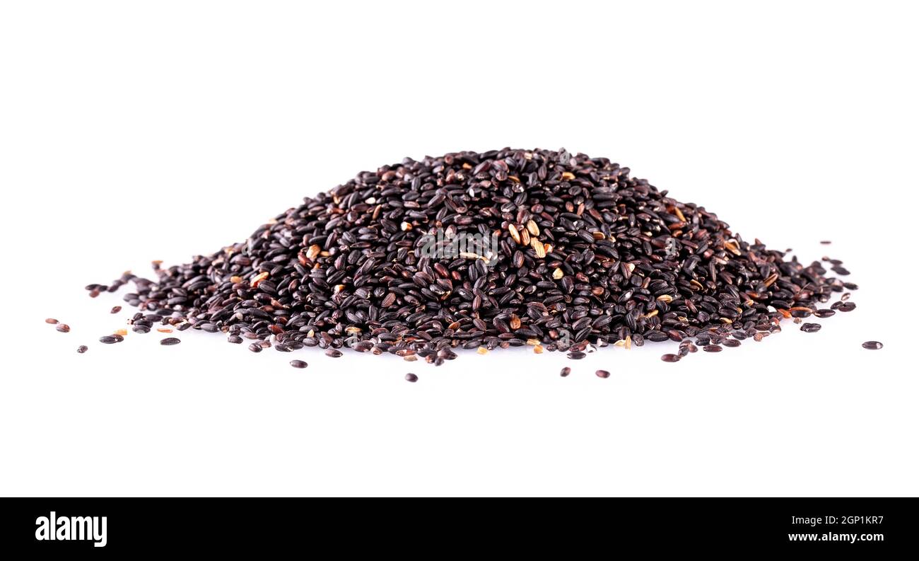 Black rice isolated on a white background Stock Photo - Alamy