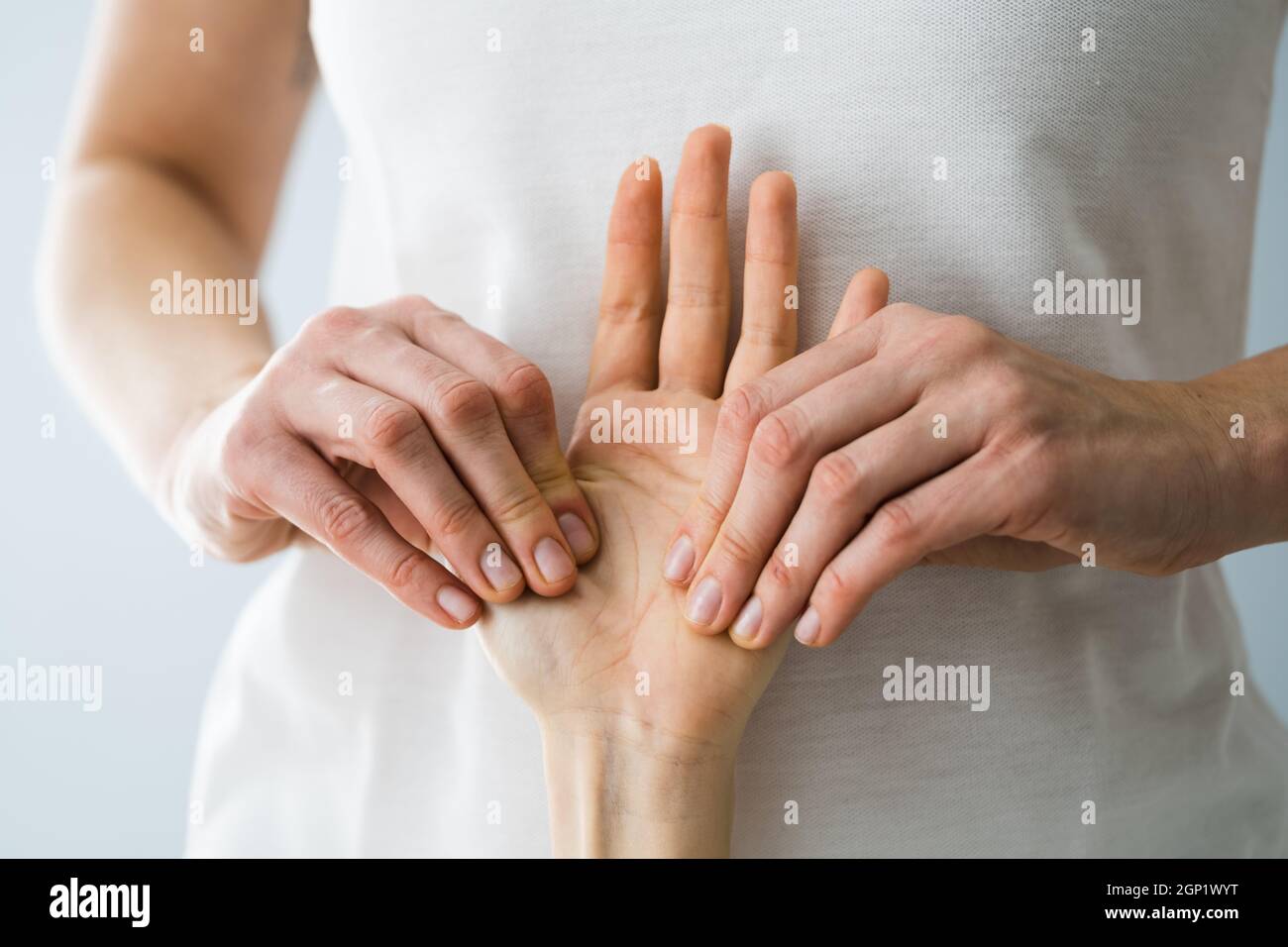 Reflexology Hand Massage And Palm Acupressure Physiotherapy Stock Photo