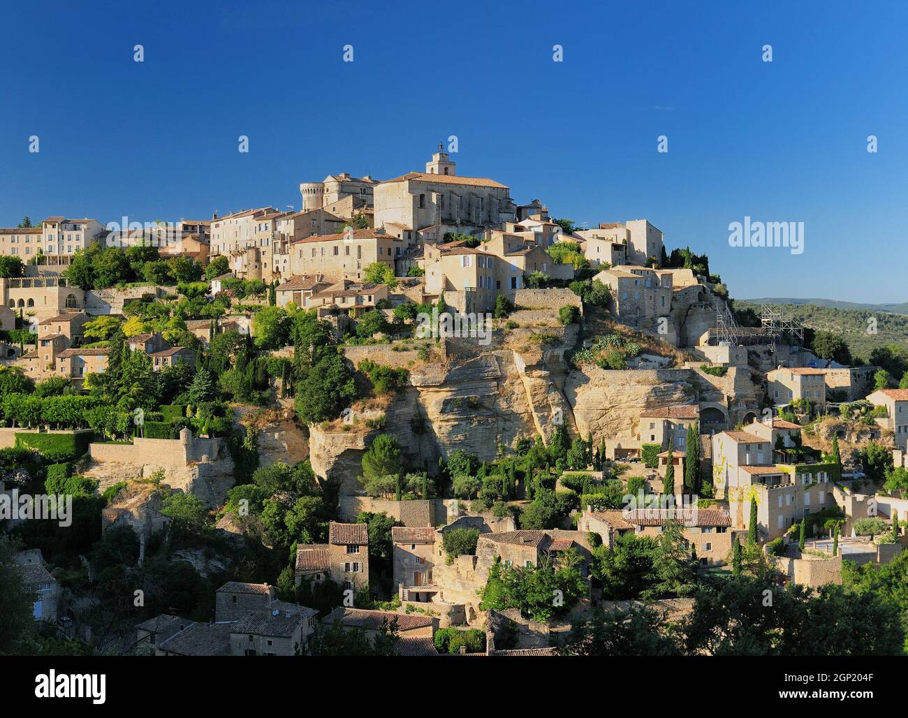 Historic Mountain Village Gordes In Provence France On A Beautiful Summer Day With A Clear Blue Sky Stock Photo
