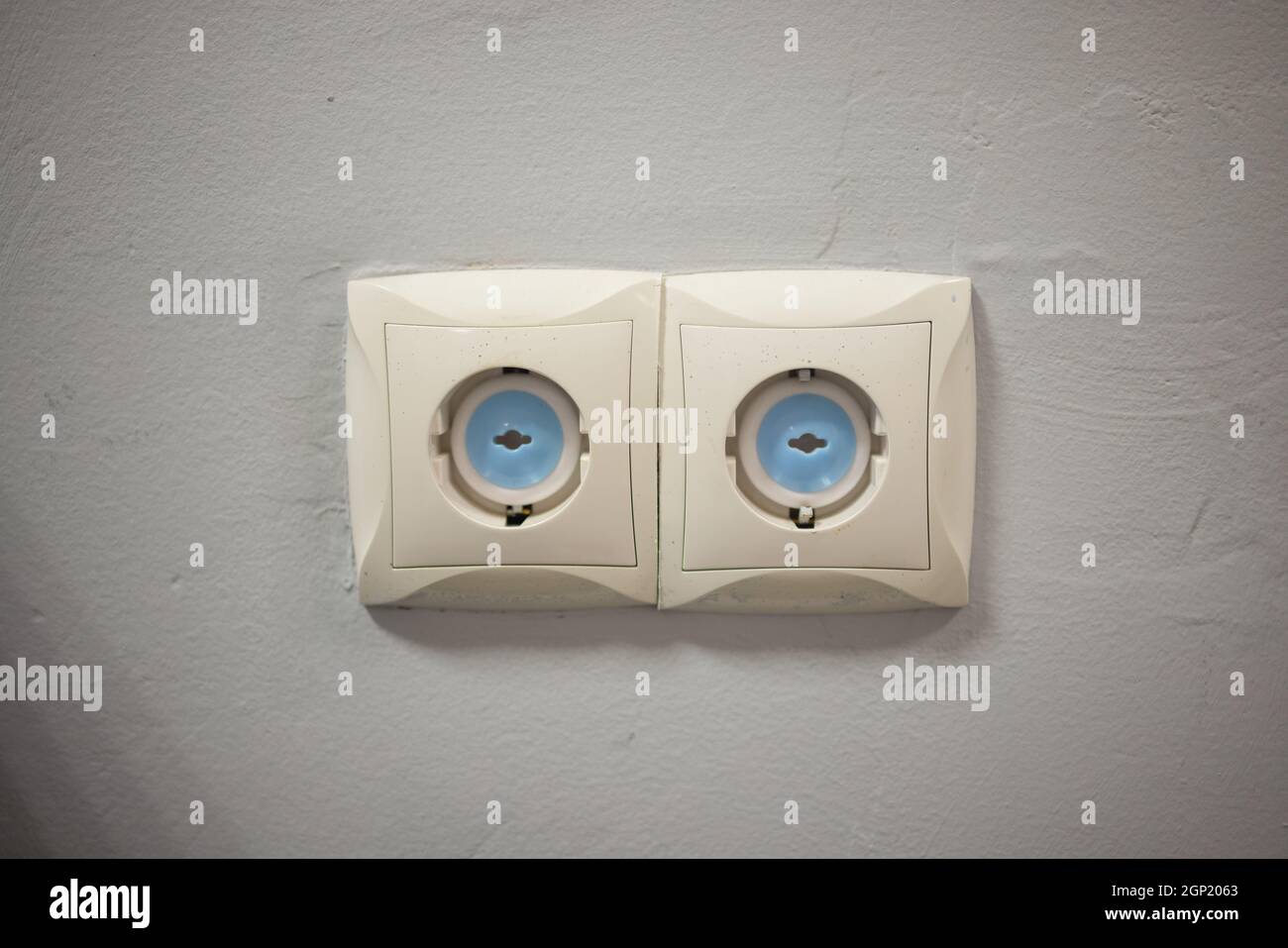 Electrical outlet with electricity safety cover to prevent child