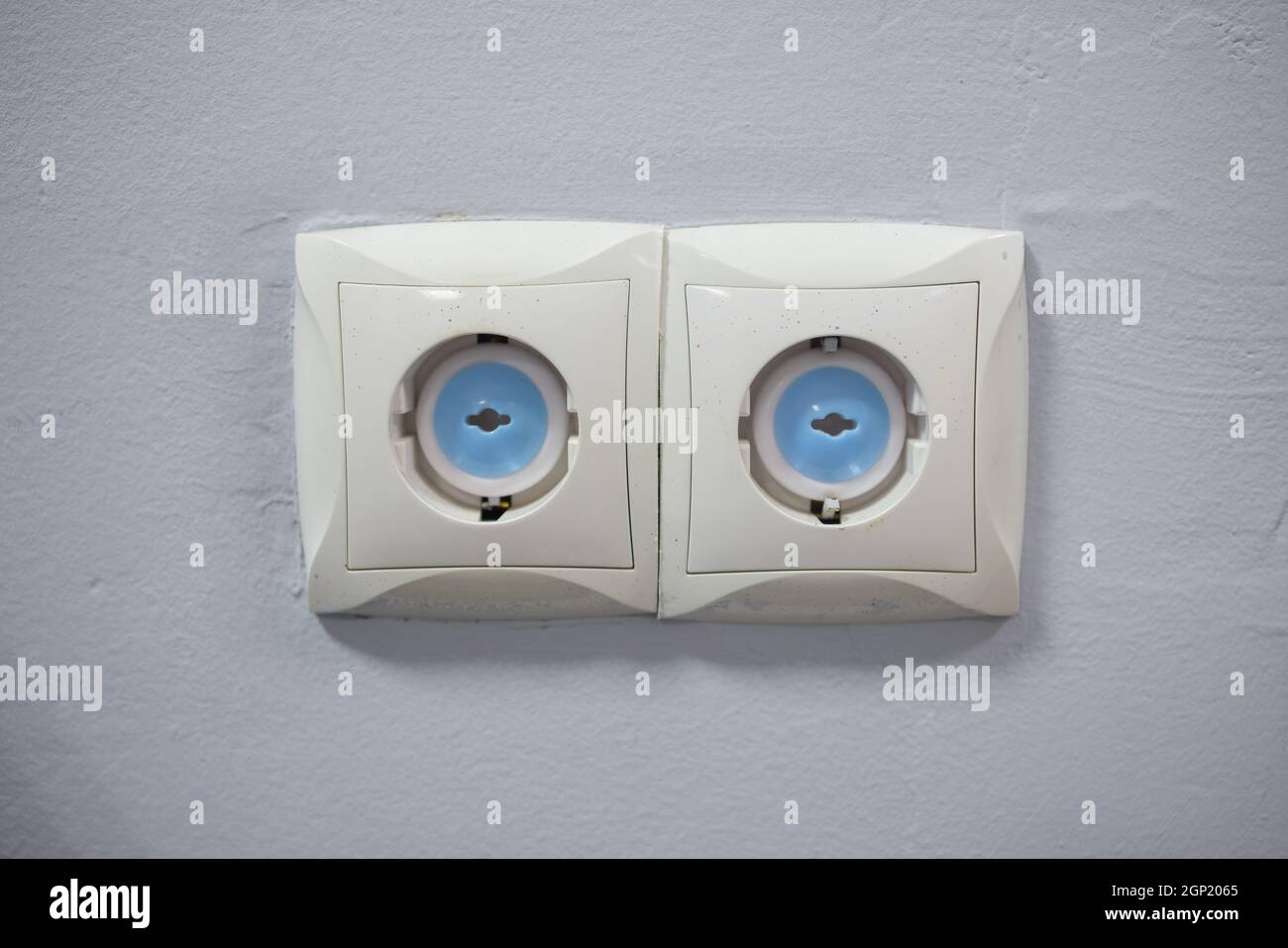 Electrical outlet with electricity safety cover to prevent child