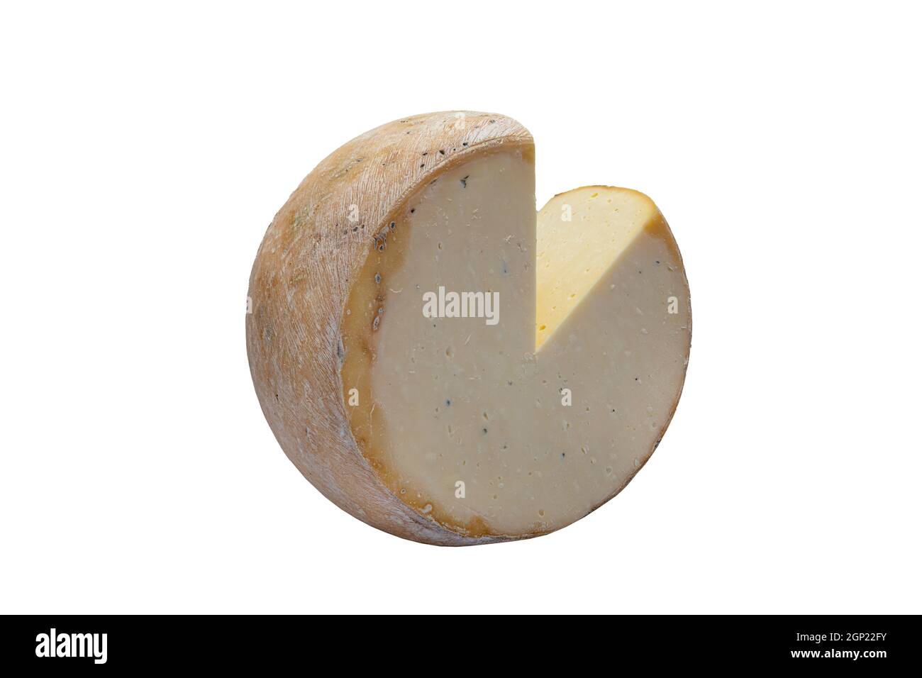 One round old cheese. Old cheddar cheese. Delicious cheese on a white