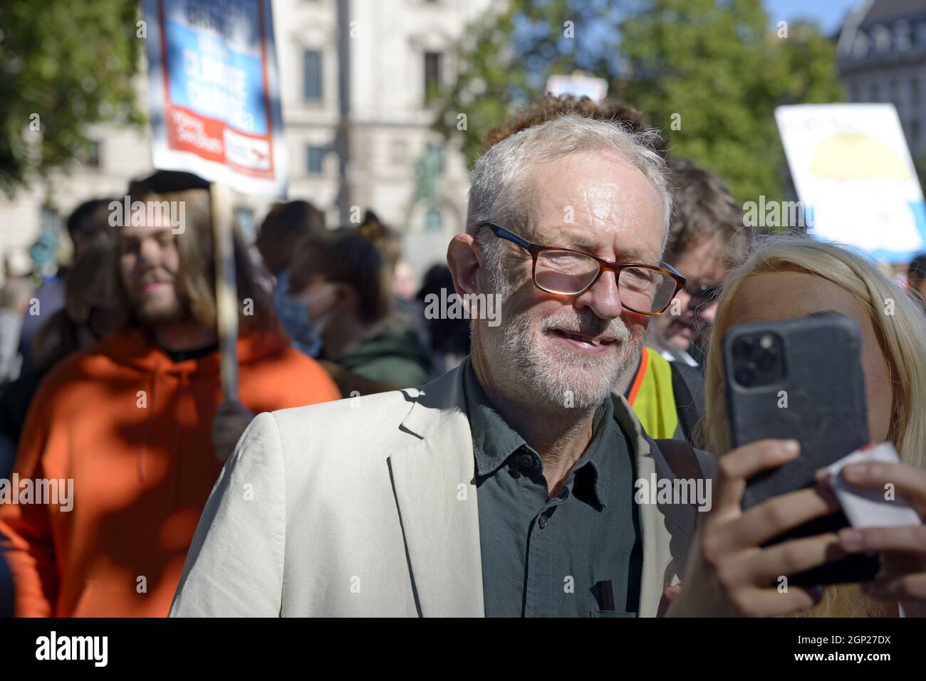 Jeremy Corbyn MP posing for a selfie at a Fridays for Future environmental protest in Parliament Square, Sept 2021 Stock Photo