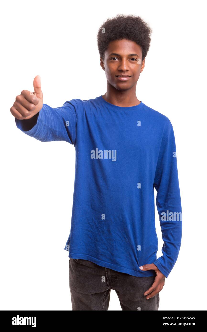 A casual young black boy posing isolated Stock Photo - Alamy