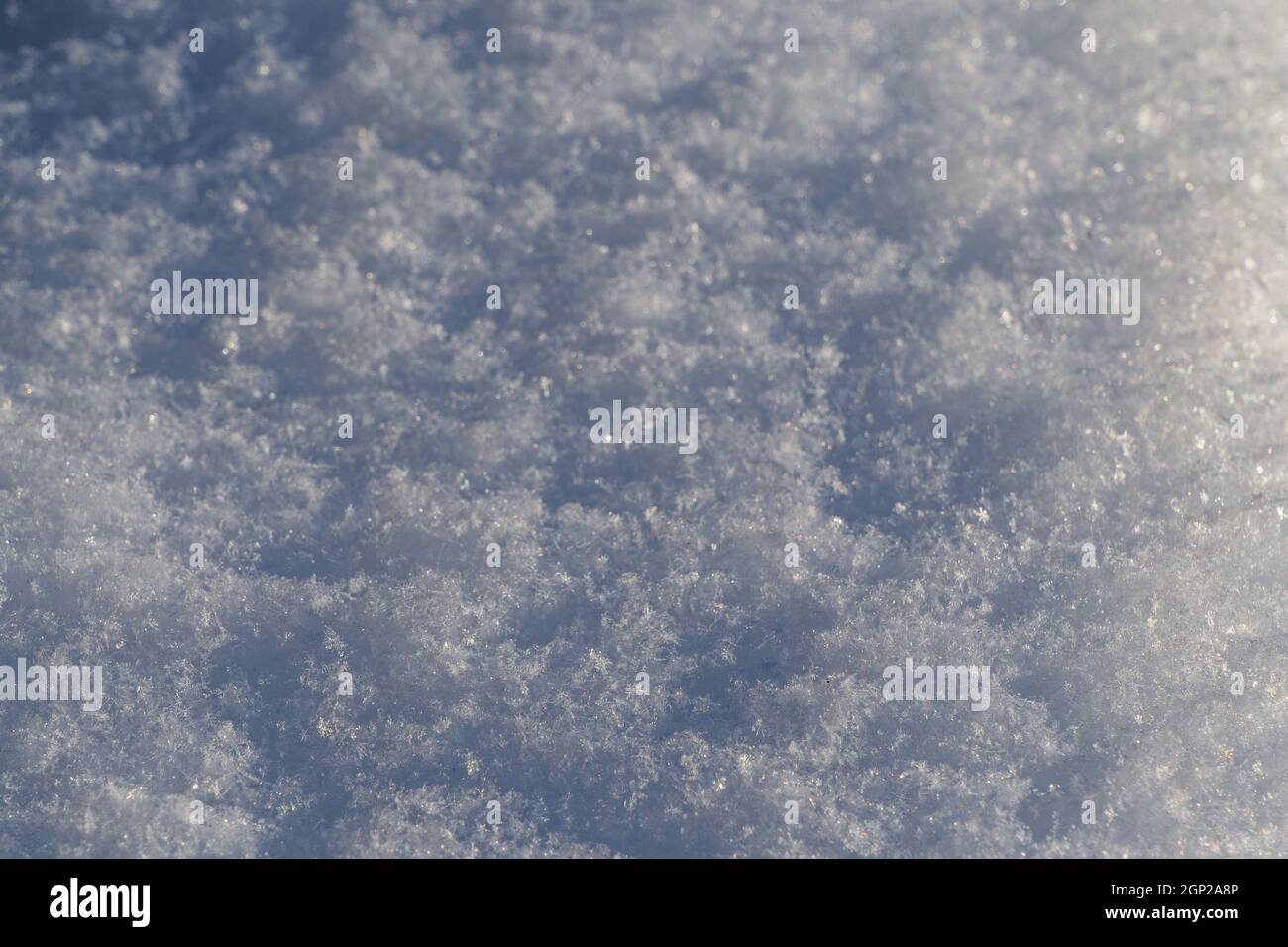Seamless Close View White Snow Background Texture. Stock Photo