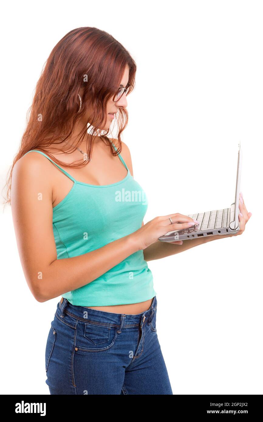 Young student working with her laptop, isolated over a white background ...