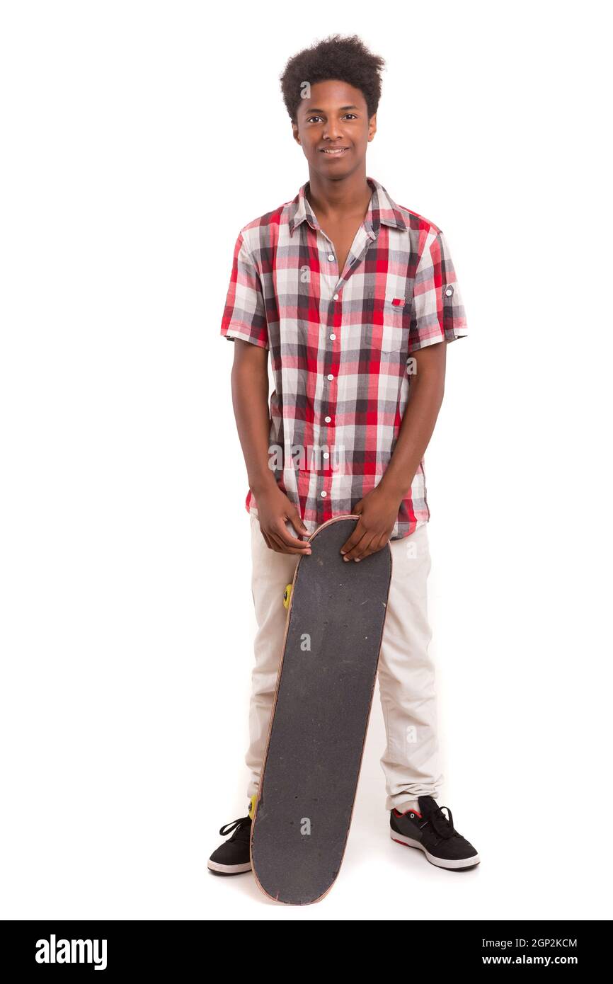 A young black skater posing in studio Stock Photo