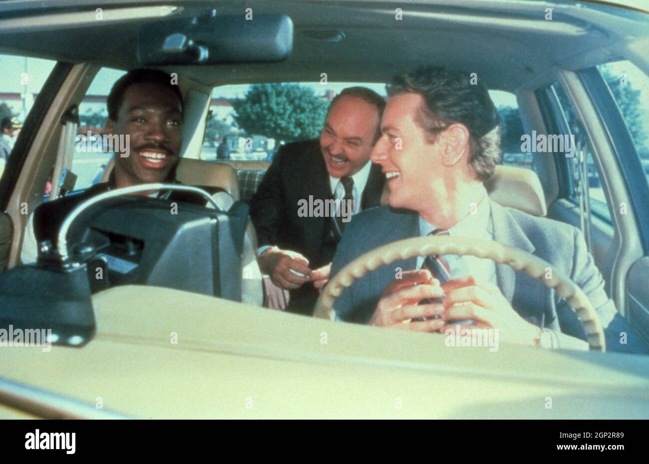 BEVERLY HILLS COP II, from left: Eddie Murphy, John Ashton, Judge