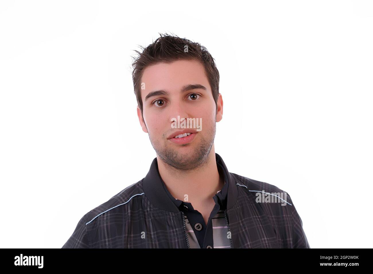 Young casual man posing, isolated in white background Stock Photo - Alamy