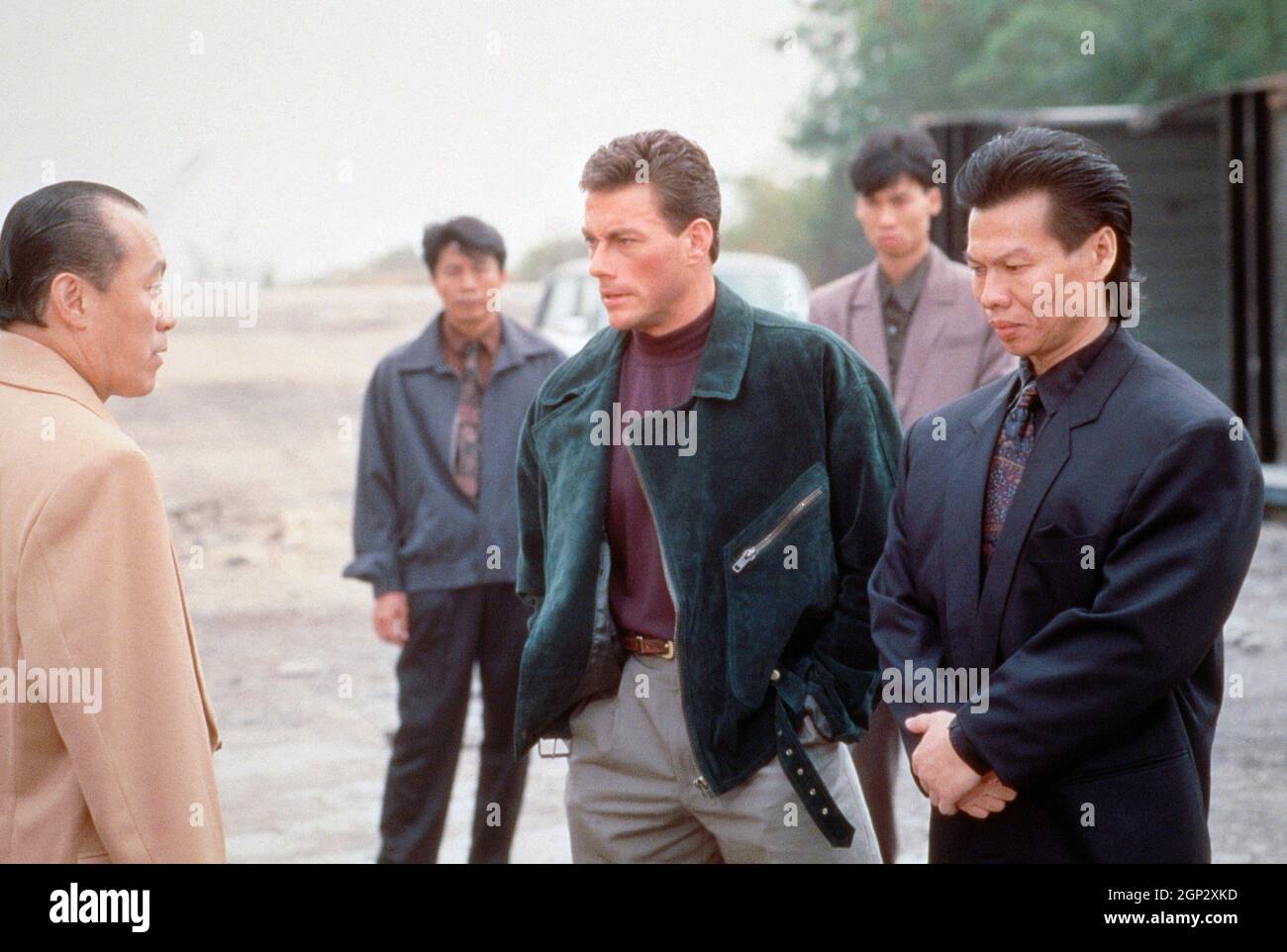 DOUBLE IMPACT, foreground, from left: Philip Chan, Jean-Claude Van Damme, Bolo  Yeung, 1991. ph: © Columbia Pictures / courtesy Everett Collection Stock  Photo - Alamy