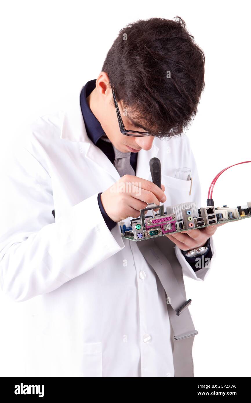 Computer engineer working on an old motherboard Stock Photo