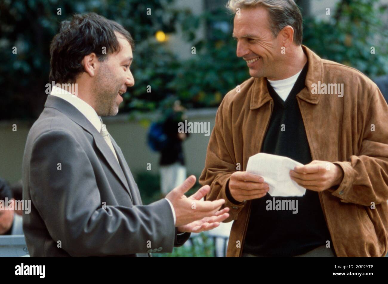 FOR LOVE OF THE GAME, from left: Sam Raimi, director, Kevin Costner, on ...