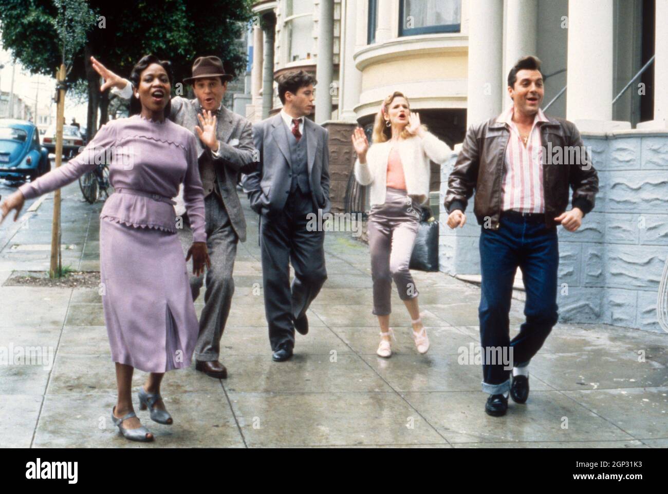 HEART AND SOULS, from left: Alfre Woodard, Charles Grodin, Robert Downey Jr., Kyra Sedgwick, Tom Sizemore, 1993. ph: Bruce W. Talamon / © Universal Pictures / Courtesy Everett Collection Stock Photo