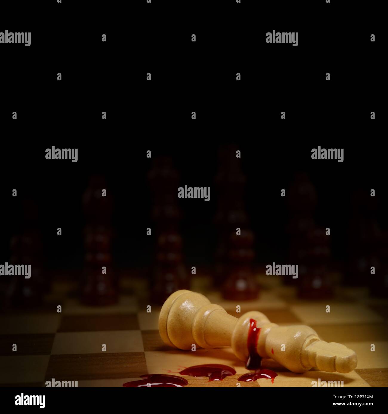 A Chessboard game in the position of checkmate spotlighting the dead ...