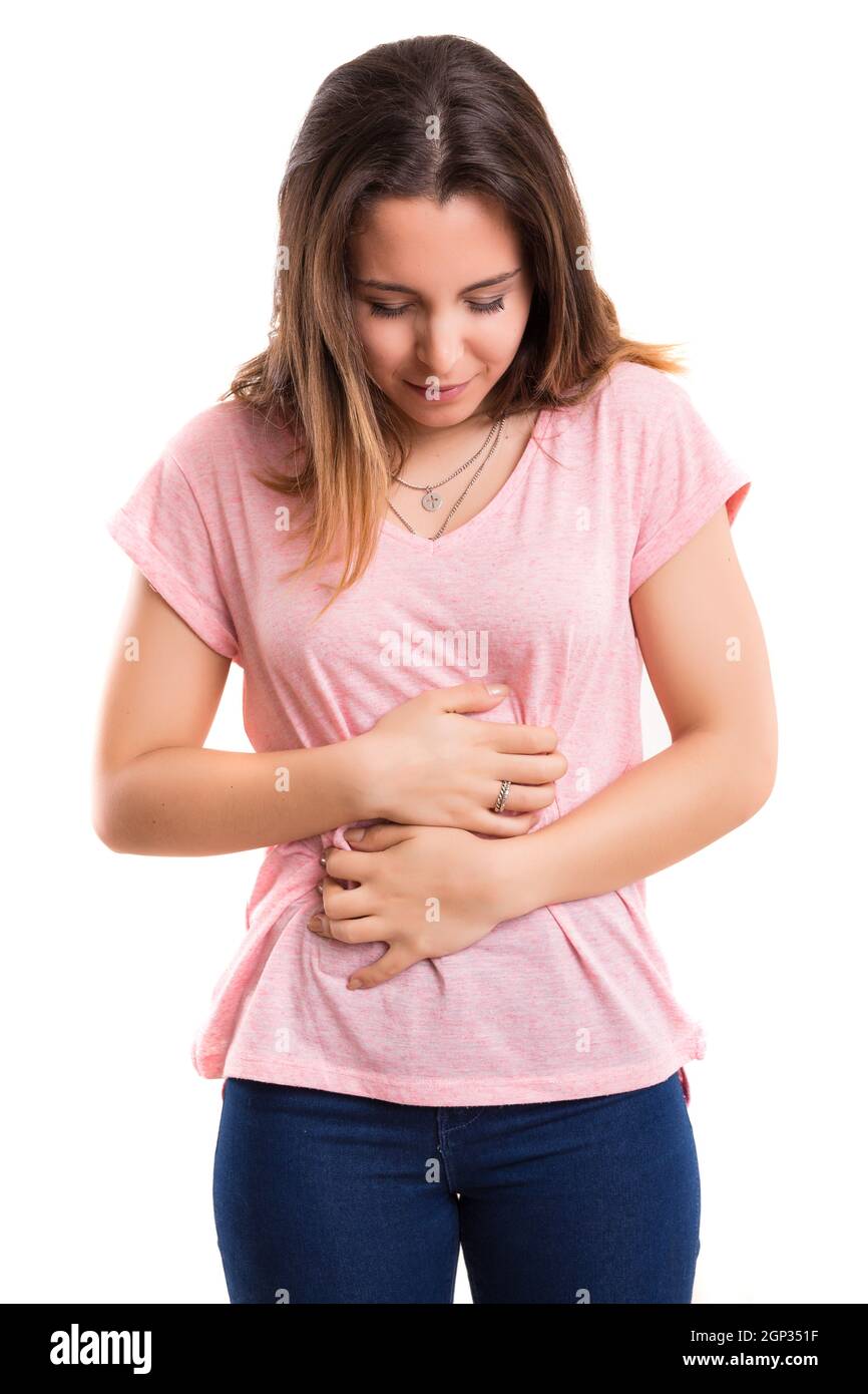 Young woman suffering from stomach ache, isolated over white Stock
