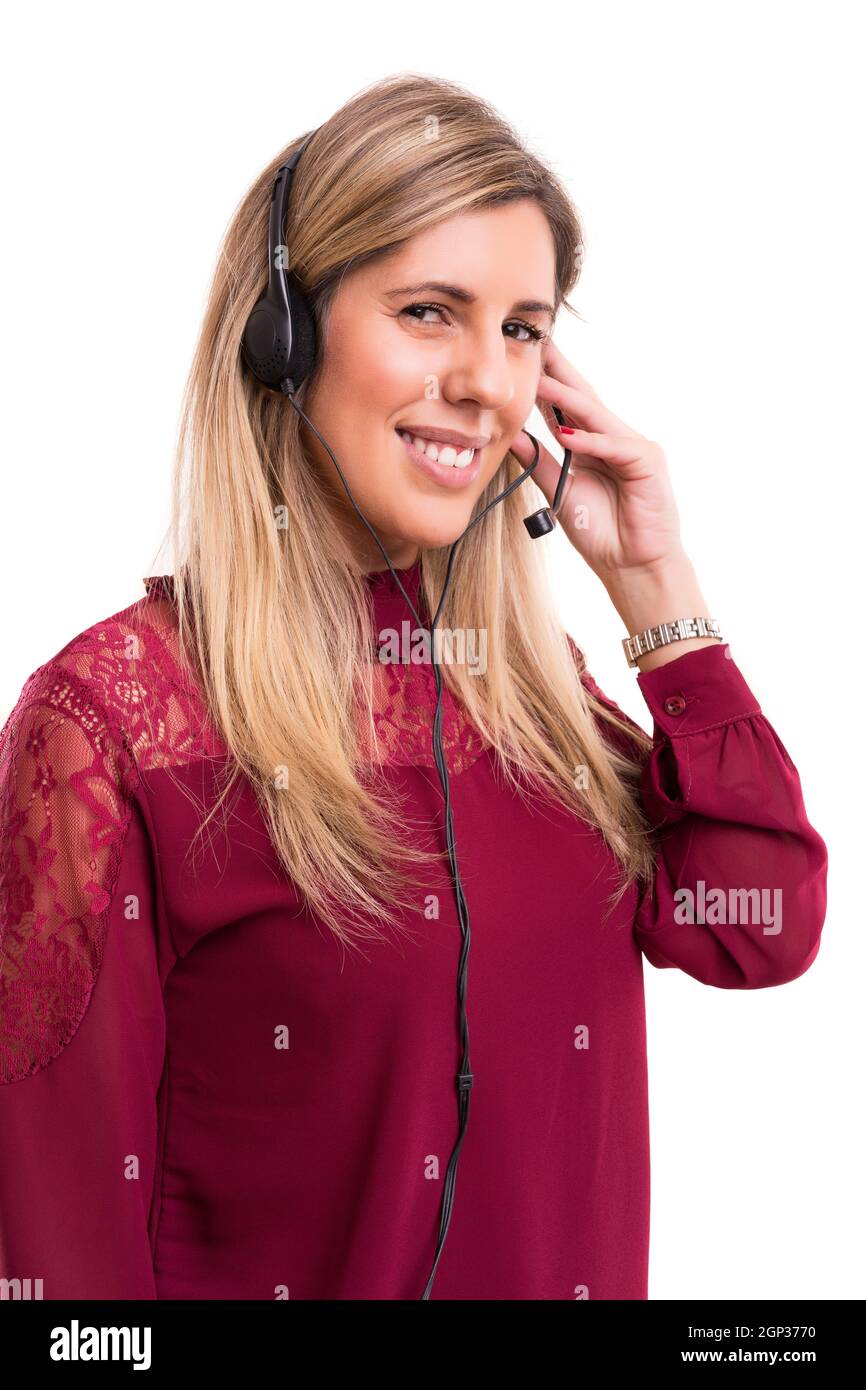 A friendly telephone operator smiling isolated over a white background
