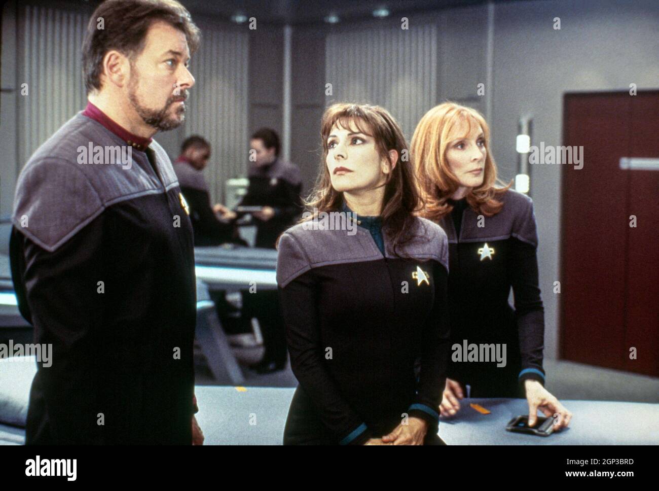 STAR TREK NEMESIS, frpm left Jonathan Frakes, Marina Sirtis, Gates