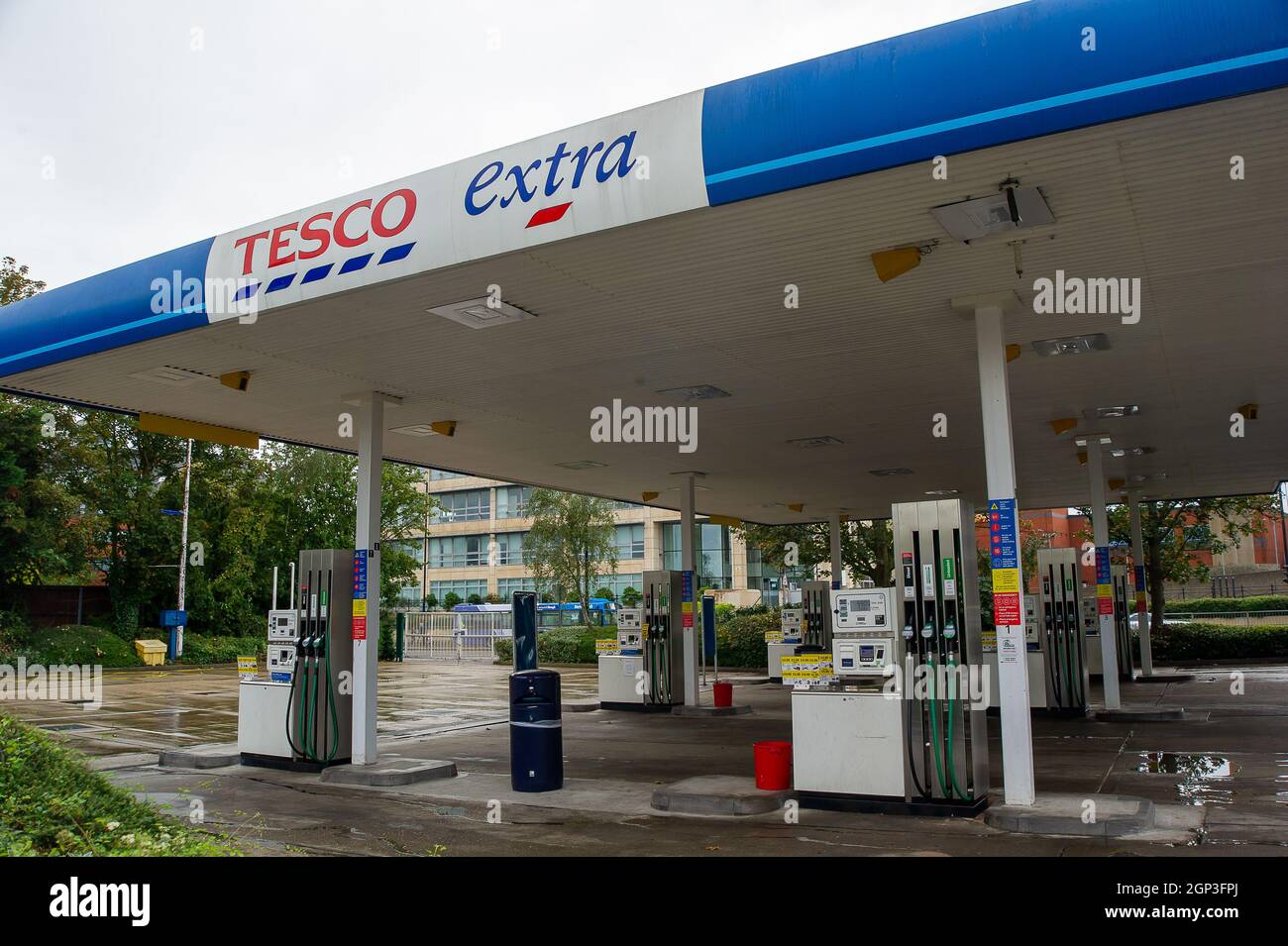 Slough, UK. 28th September, 2021. The Tesco petrol station on the A4 in Slough was barried off and closed today due to a shortage of both petrol and diesel. Panic buying of petrol and diesel has continued over the past few days due to a shortage of drivers making fuel deliveries following Brexit and the Covid-19 Pandemic. Credit: Maureen McLean/Alamy Live News Stock Photo