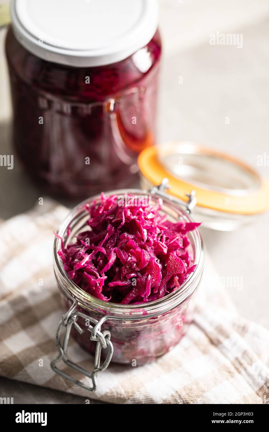 Red sauerkraut. Sour pickled cabbage in jar Stock Photo Alamy