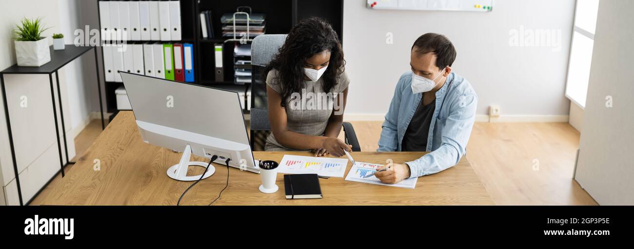 African American In Business Office Using Face Mask Stock Photo - Alamy