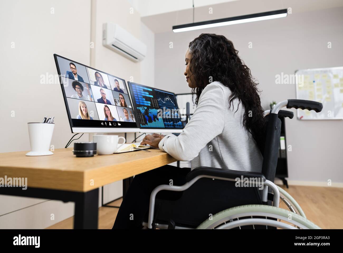 Online Virtual Learning Conference. Working On Multiple Screens Stock Photo