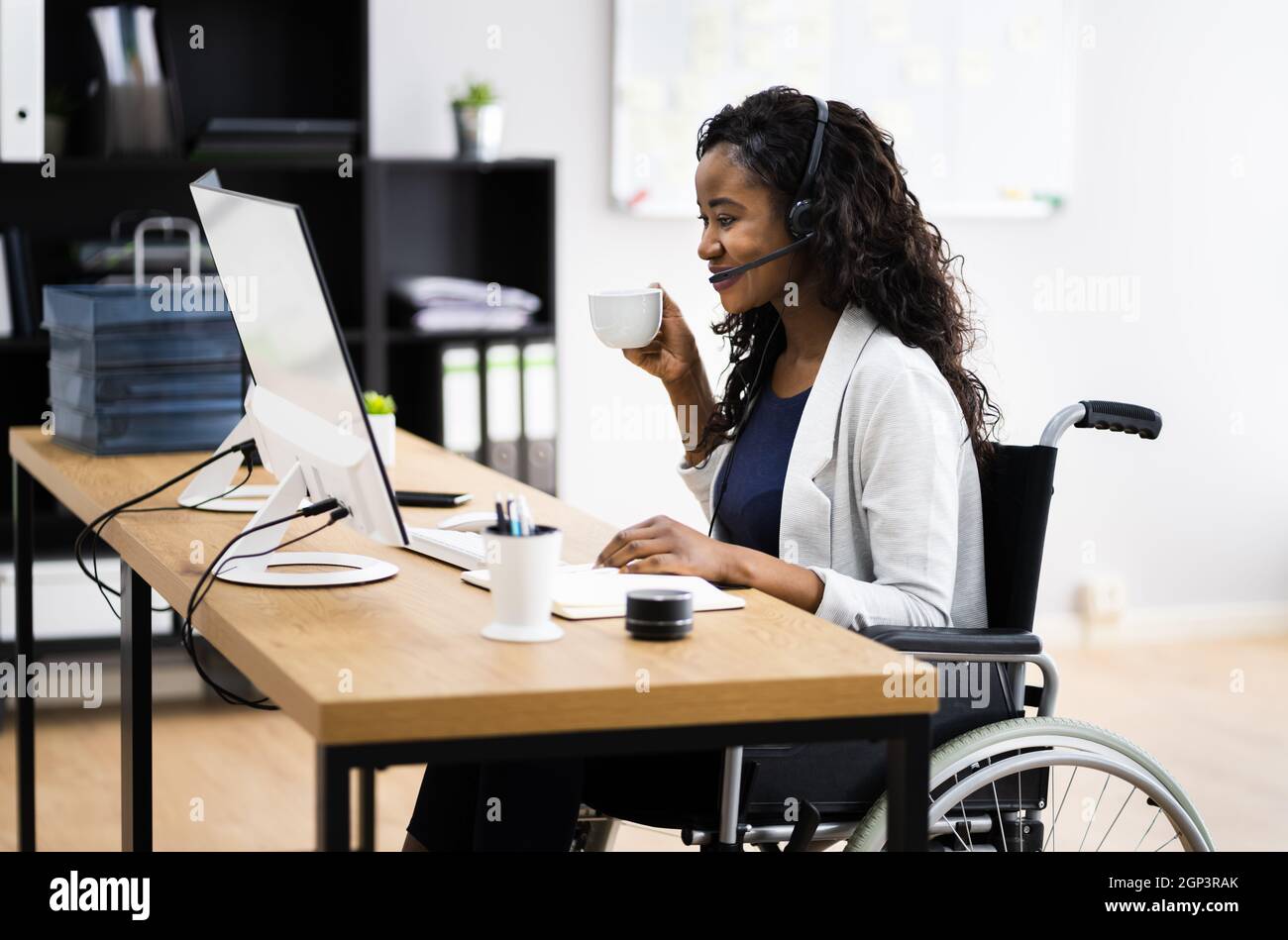 Disabled Black Woman In Wheelchair Making Video Call Stock Photo Alamy