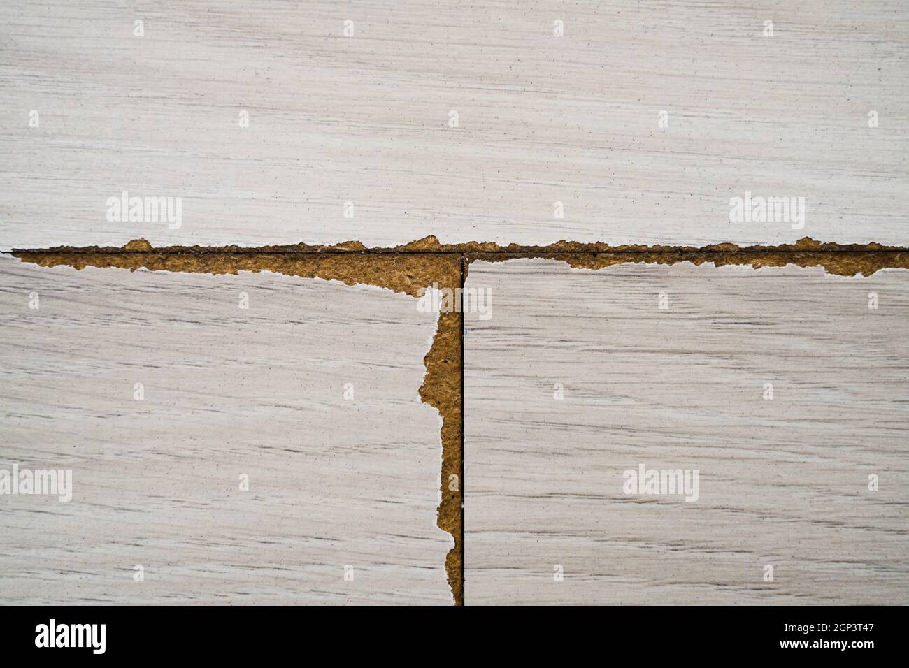 Damaged Old Laminate Flooring Surface At Home Stock Photo - Alamy