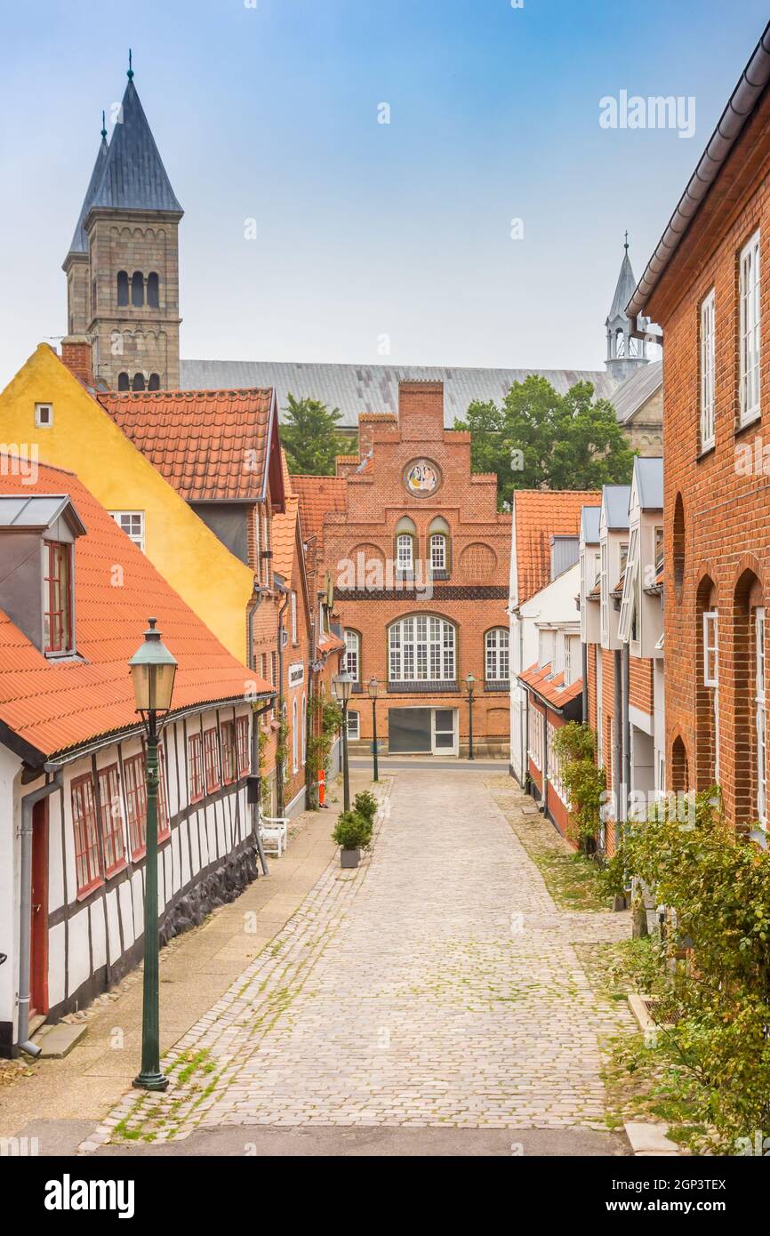 Street with old houses leading to the Domkirke church in Viborg, Denmark Stock Photo
