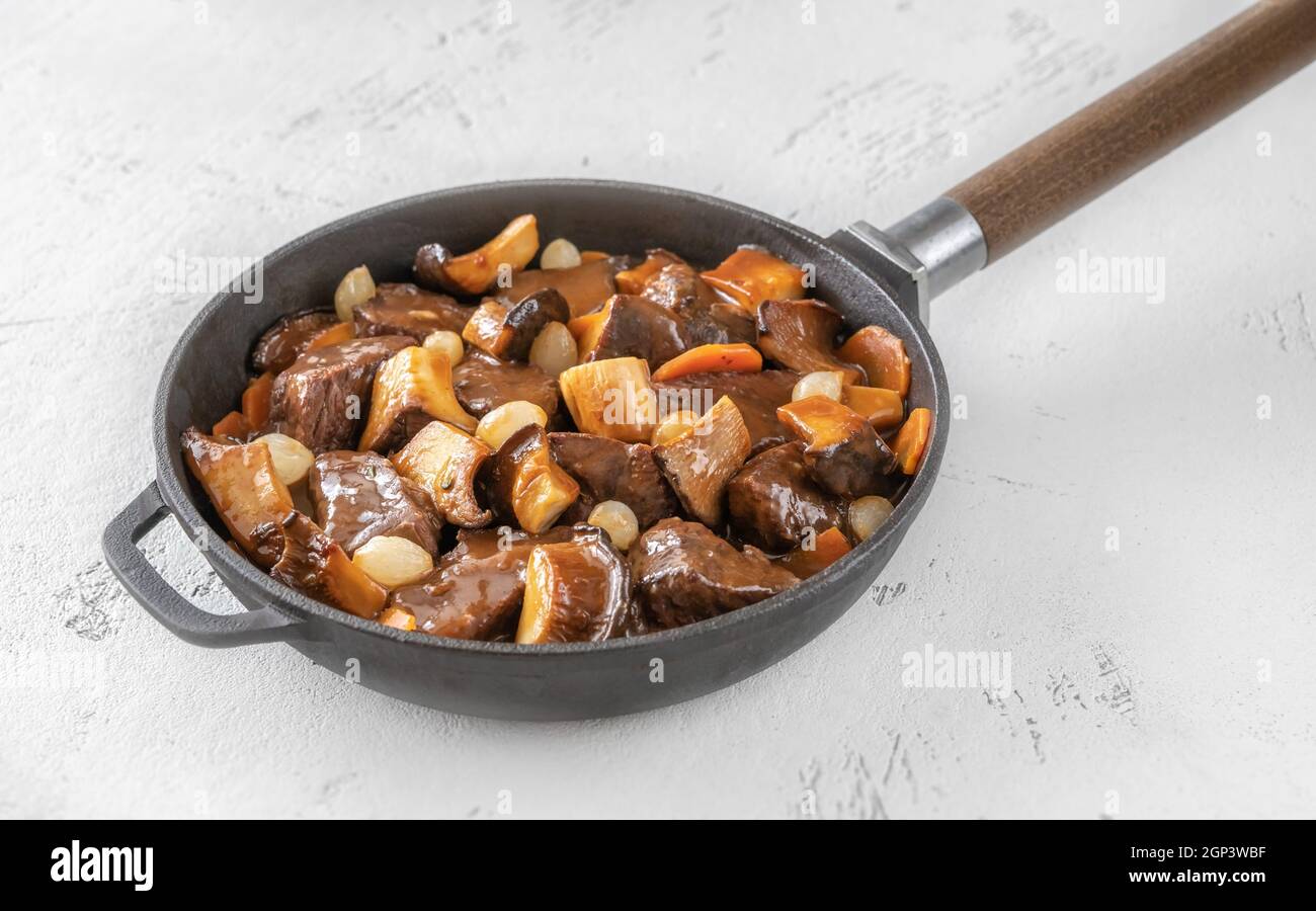 Beef bourguignon - French beef stew in the skillet Stock Photo