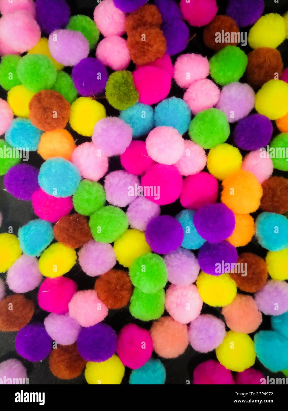 Close up sweet Colorful Pom Poms ball Texture abstract Background for web  design Stock Photo - Alamy