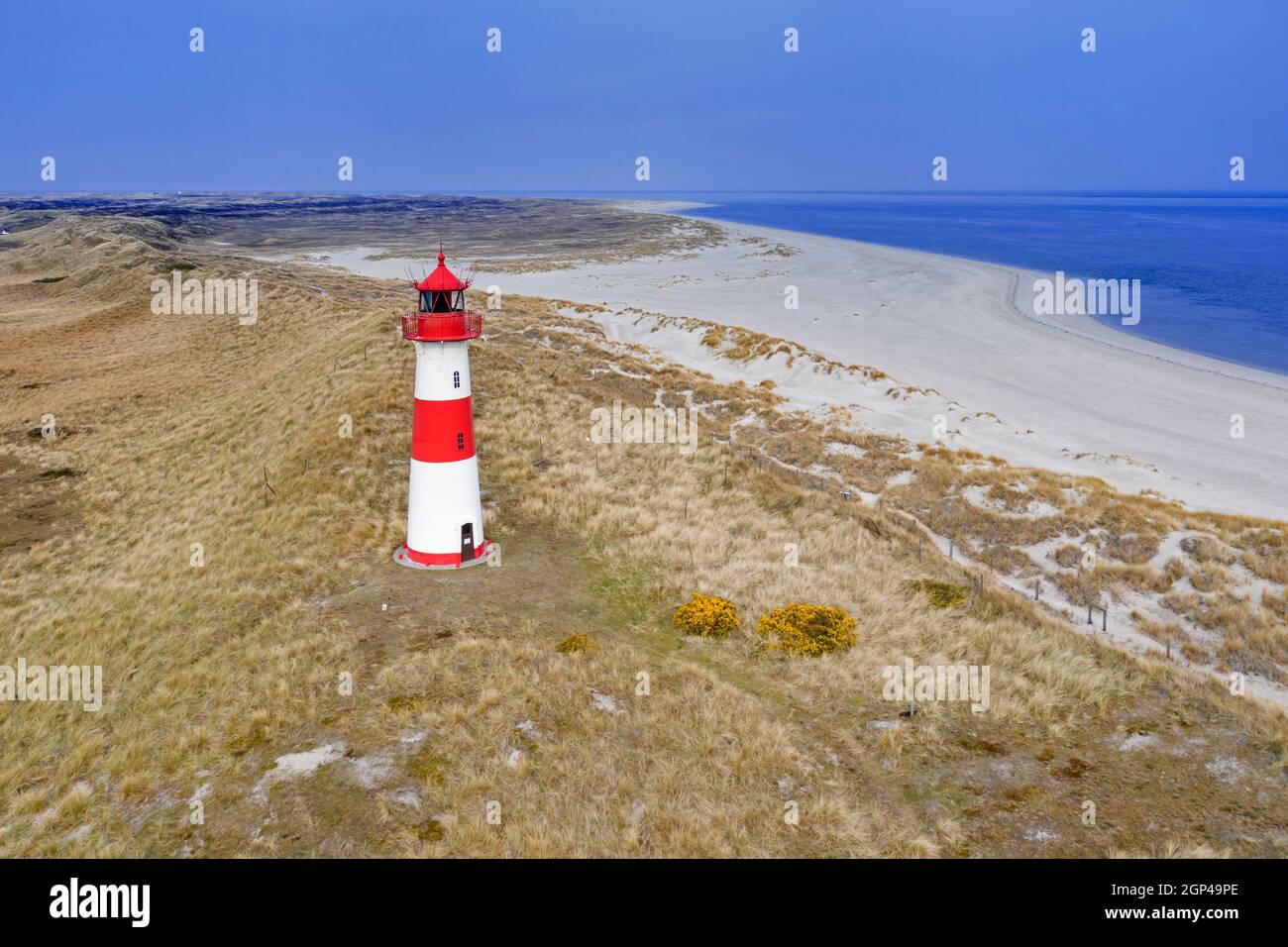 Red and white striped lighthouse List East / List-Ost on the Ellenbogen peninsula on the island Sylt, North Frisia, Schleswig-Holstein, Germany Stock Photo