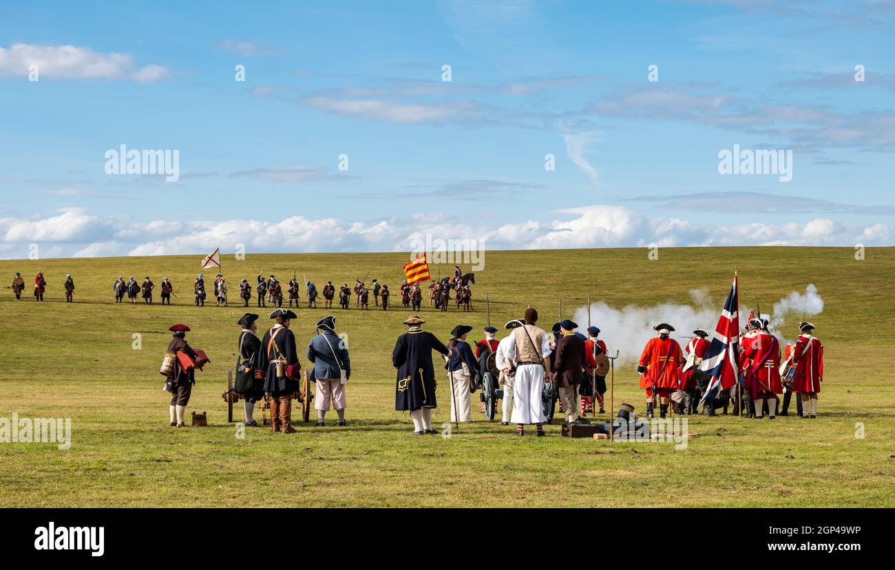 Hanoverian troops fire guns at the Jacobite army on the battlefield in re-enactment of Battle of Prestonpans, East Lothian, Scotland, UK Stock Photo