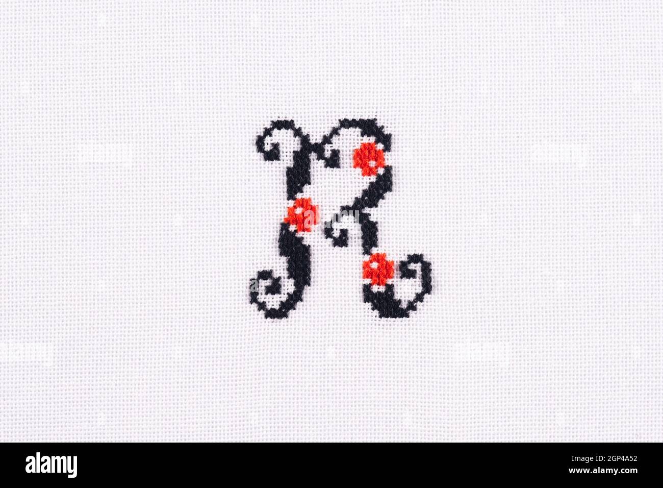 Letter R of Embroidered Cross - Stitch Latin Alphabet on White Linen Fabric  Background Handmade Close-up Stock Photo - Alamy