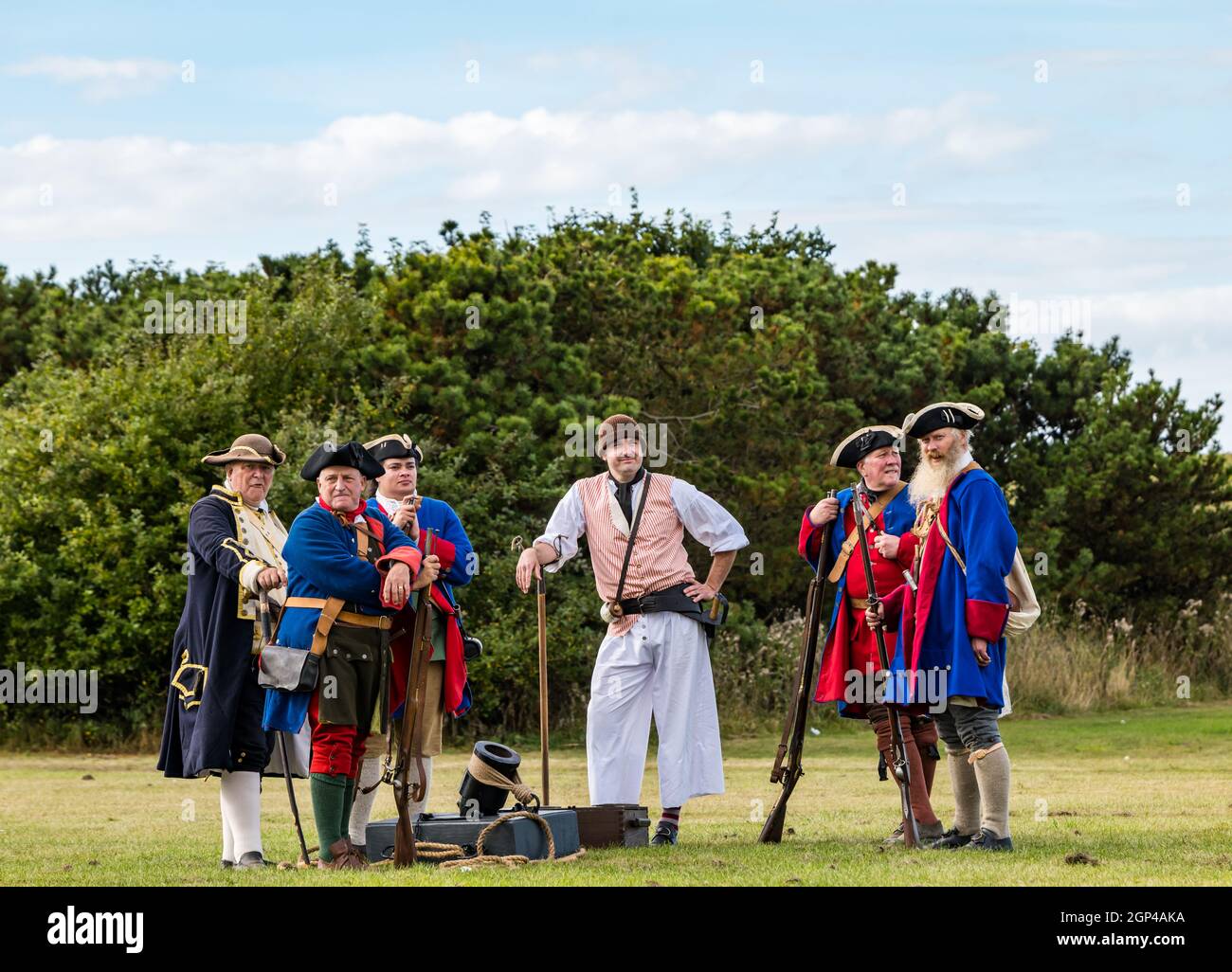 Men in naval period costume with filed gun re-enactment of Battle of Prestonpans, East Lothian, Scotland, UK Stock Photo