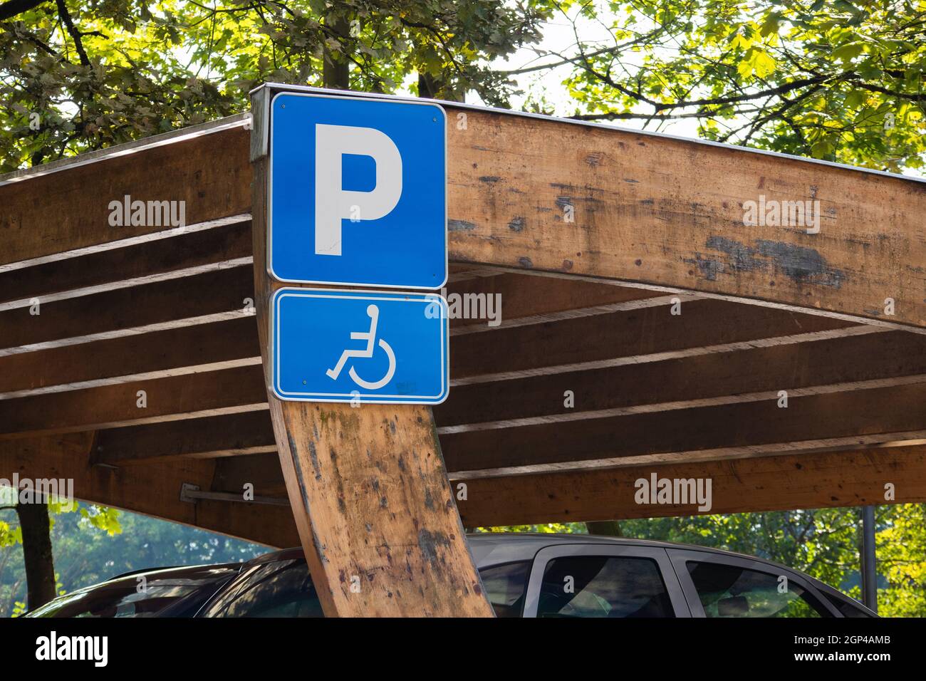 Parking spot sign for disabled wheelchair persons Stock Photo Alamy