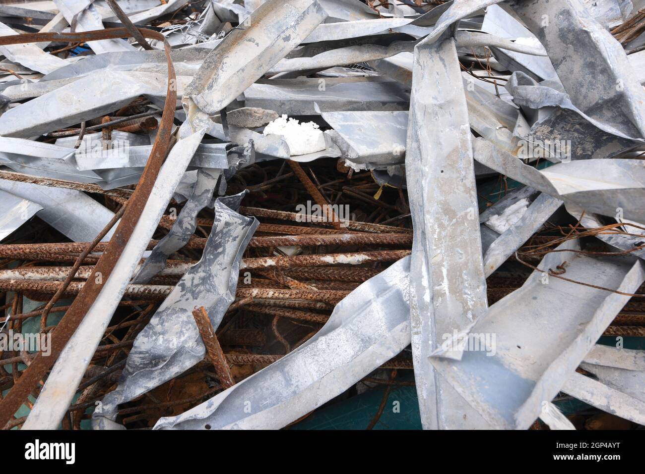 scrap iron laying on the junkyard, old and damaged materials Stock Photo