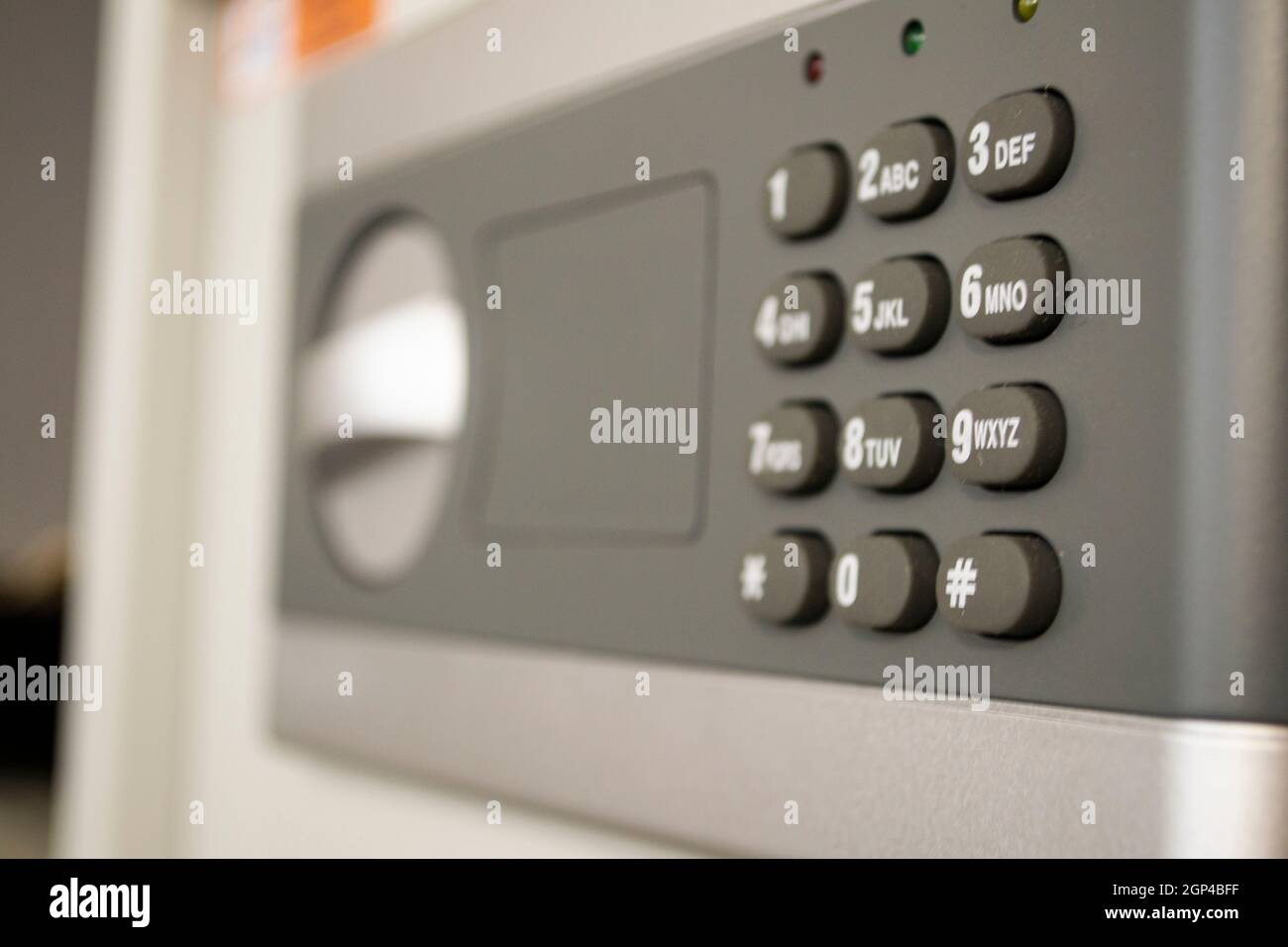 Safe lock code password pad number protection safety box bank closeup Stock Photo
