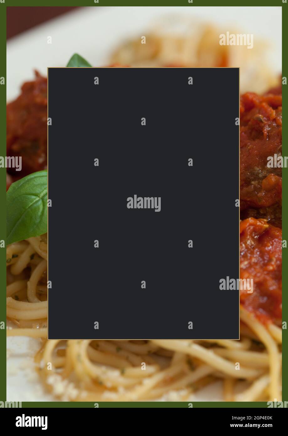 Composition of black frame over close up of spaghetti Stock Photo