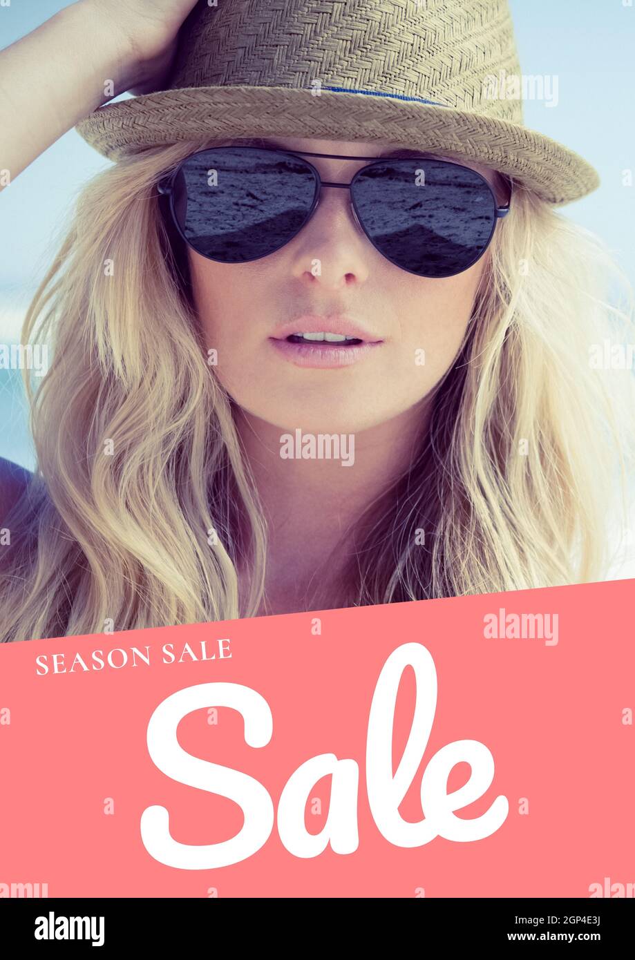 Composition of season sale text and caucasian woman wearing sunglasses and hat on pink background Stock Photo
