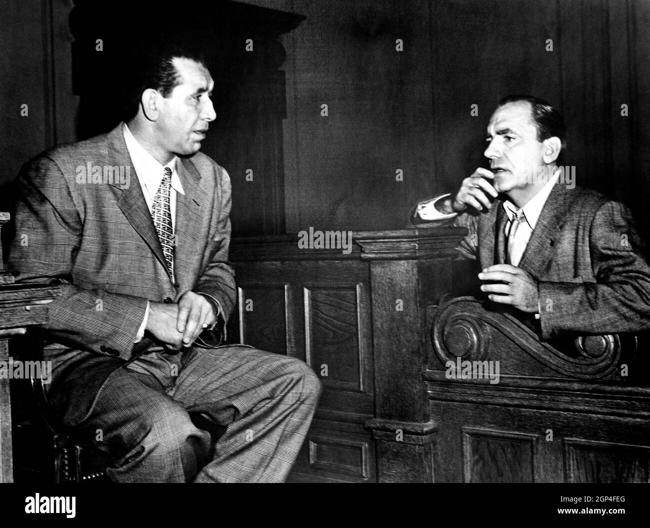 CRIMINAL LAWYER, from left, Mike Mazurki, Pat O'Brien, 1951 Stock Photo