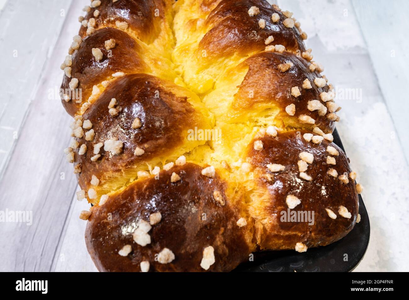 Brioche with butter and golden and crispy sugar just out of the oven