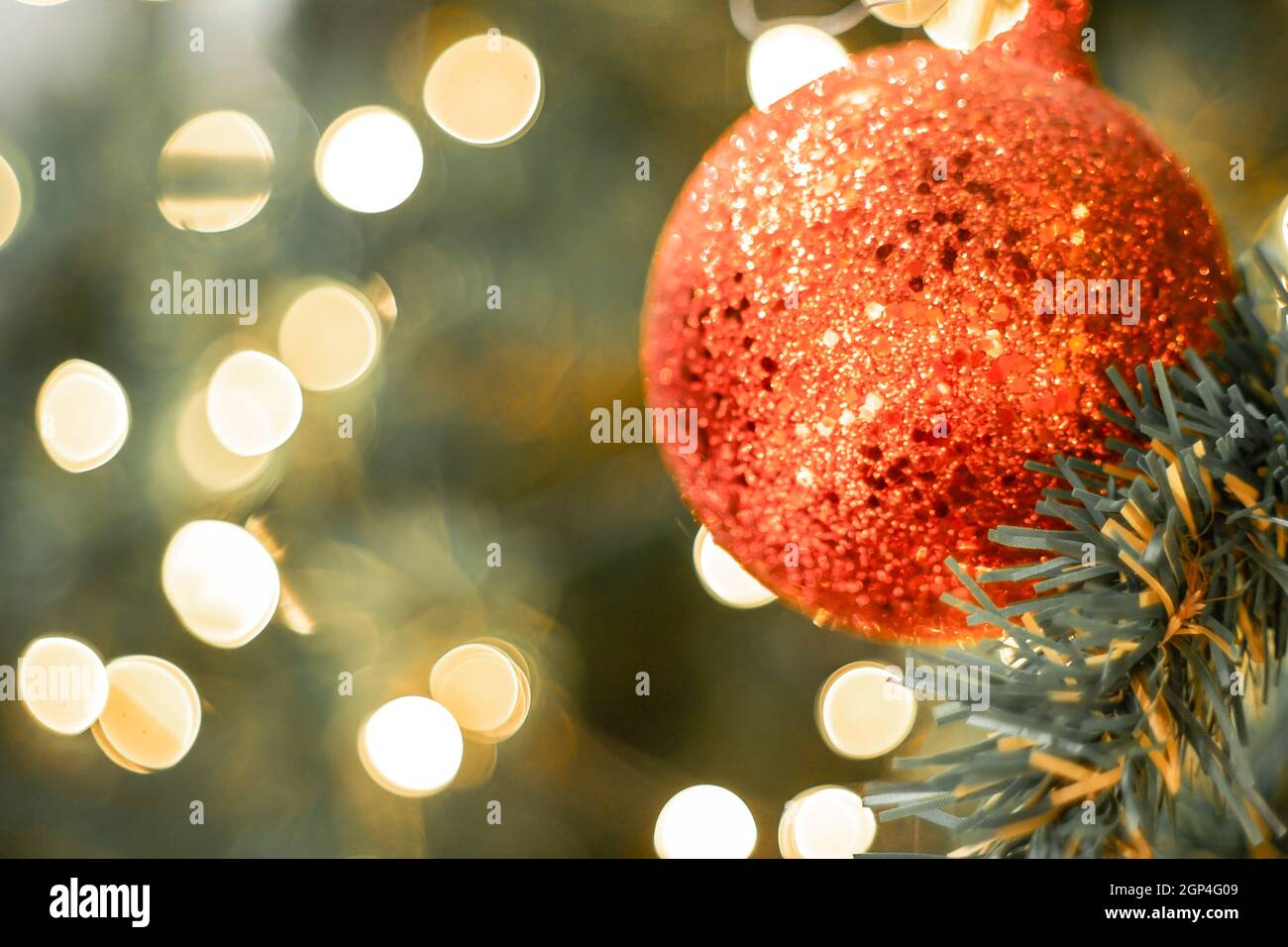 Christmas Tree red Ball And gold Bokeh Background Stock Photo - Alamy