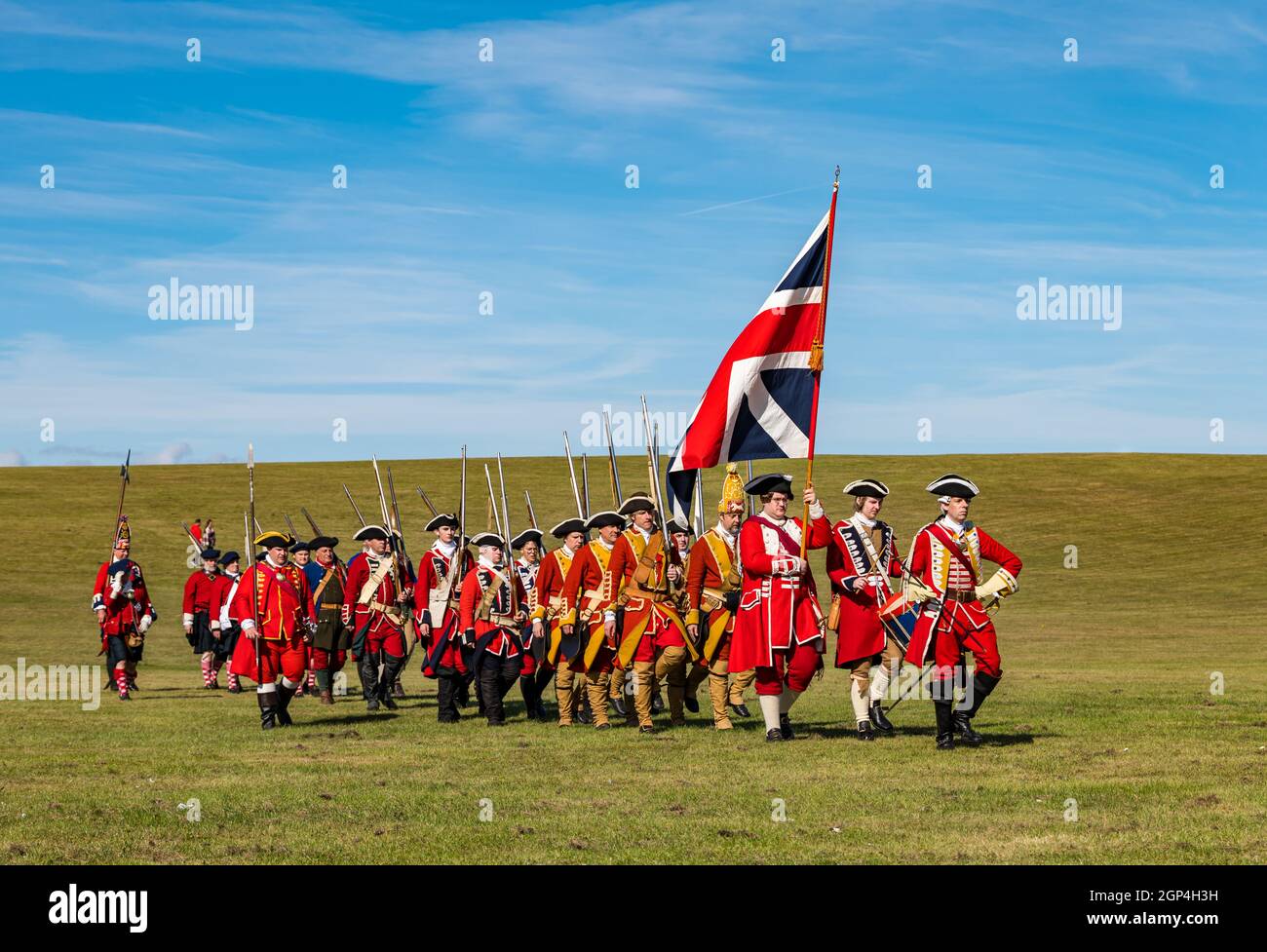 Hanoverian soldiers and officers march in period costume for re-enactment of Battle of Prestonpans , East Lothian, Scotland, UK Stock Photo