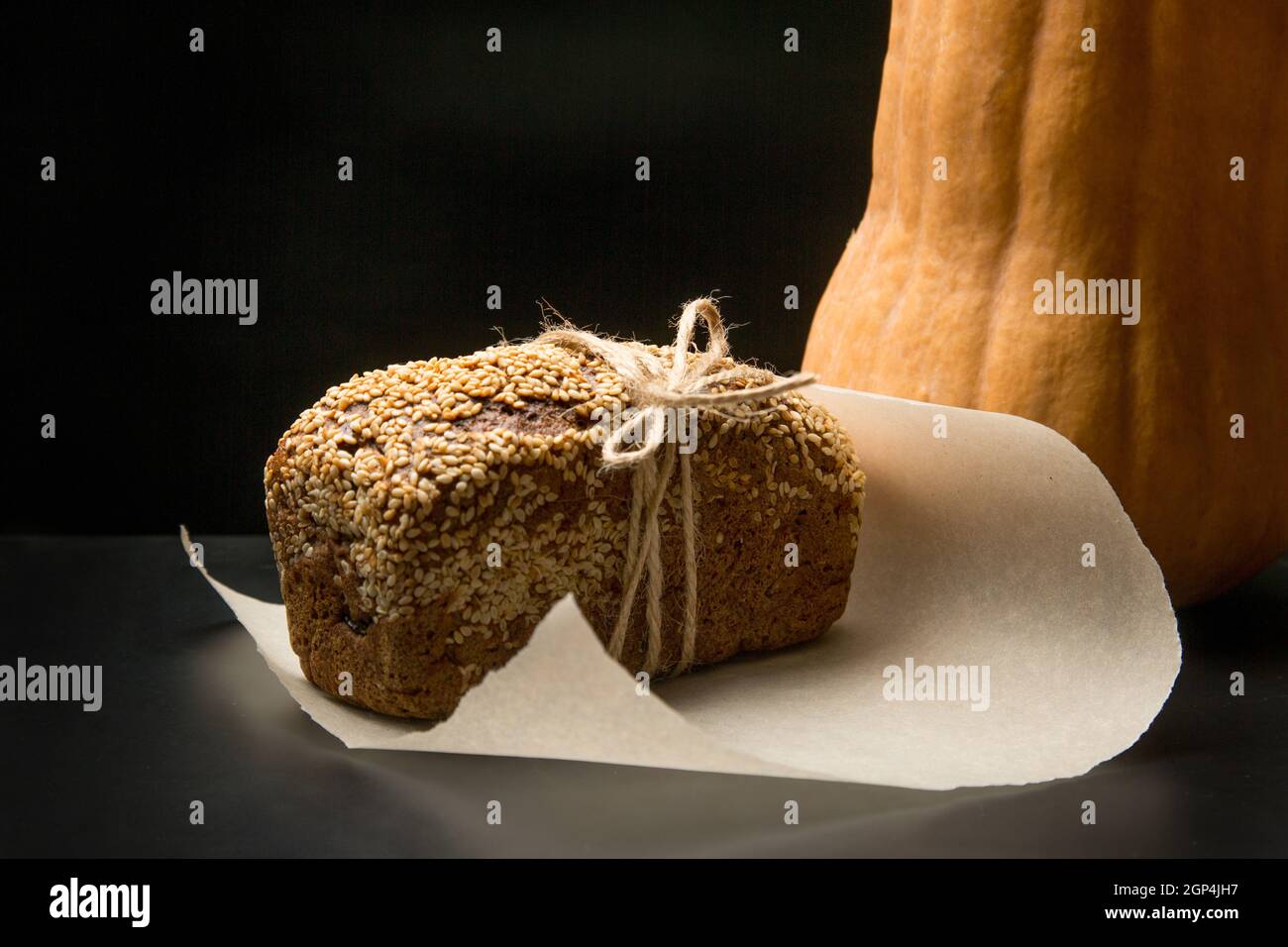 Homemade square bread with sesame seeds. Adding glutenfree flour