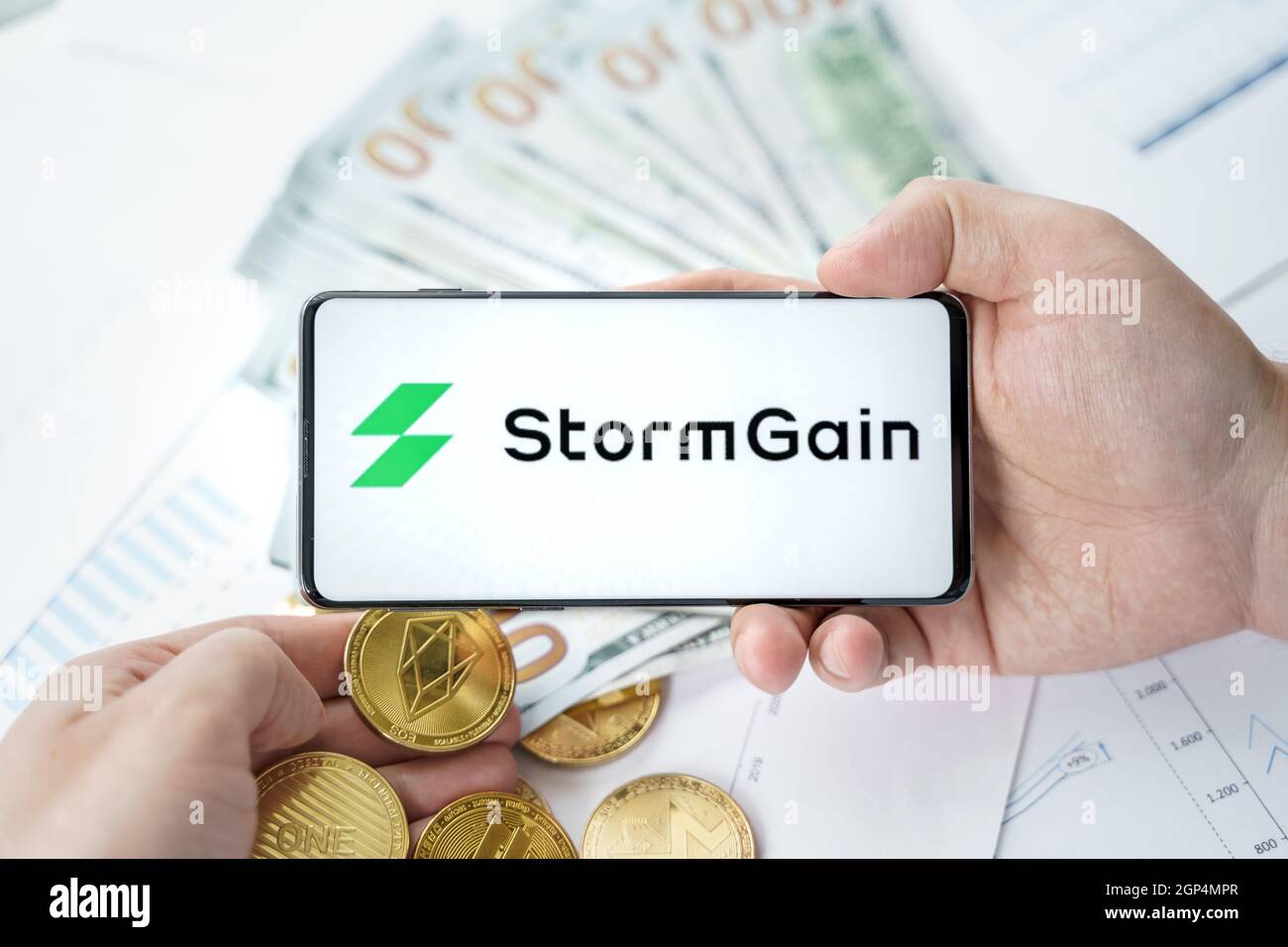Russia Moscow 20.05.2021 Stormgain logo in mobile phone.Cryptocurrency  decentralized exchange DEX.Trading blockchain platform.Swap,buy,sell crypto  tok Stock Photo - Alamy