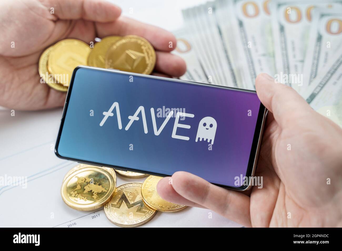 Russia Moscow 20.05.2021 AAVE logo in mobile phone. Open Source Liquidity DEX Protocol. Cryptocurrency decentralized exchange. Trading blockchain plat Stock Photo