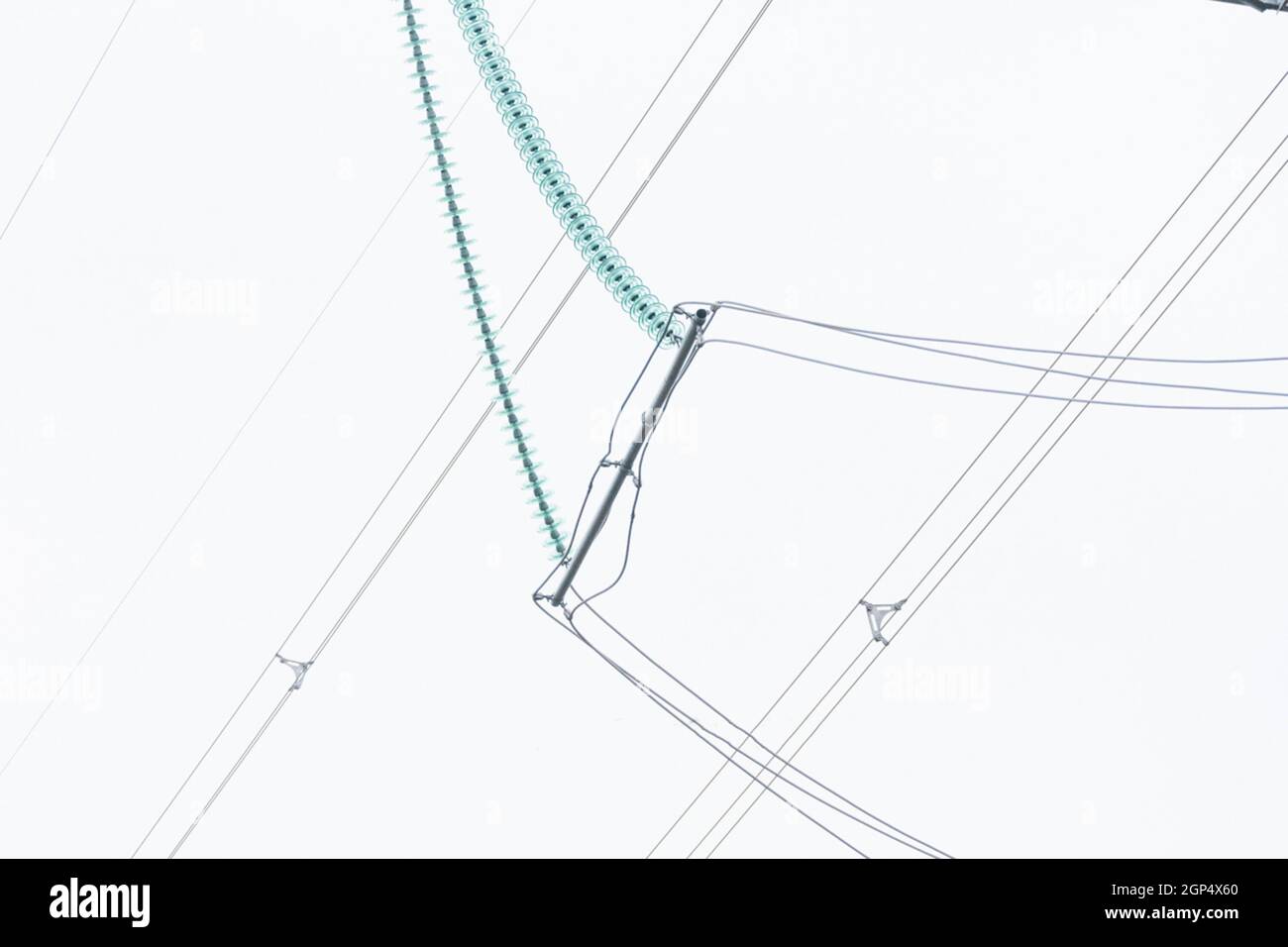 Glass insulators on high-voltage power line poles Stock Photo - Alamy