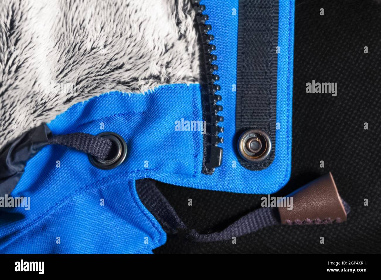 The clasps on the jacket. Lightning and lace and button. Stock Photo