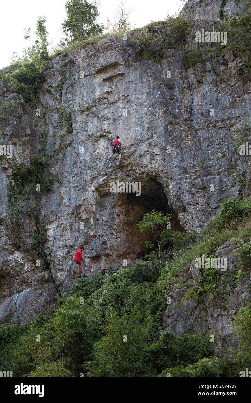 People climbing on Cheddar Gorge in Somerset in the UK Stock Photo