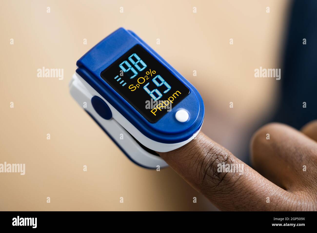 African Hand Pulse Heart Rate And Oximeter Stock Photo Alamy